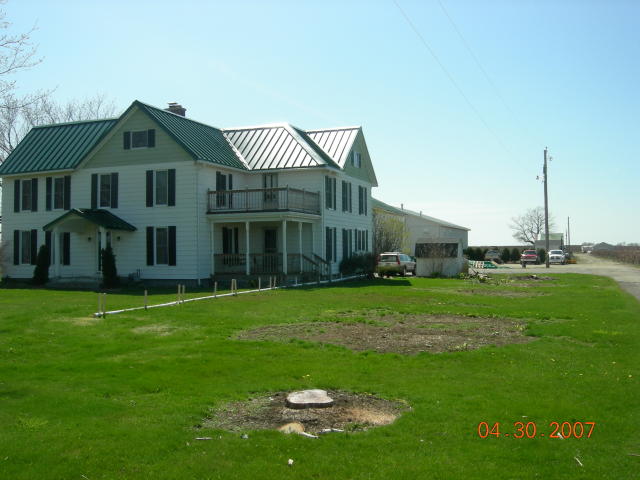 House with sump drainage pipe