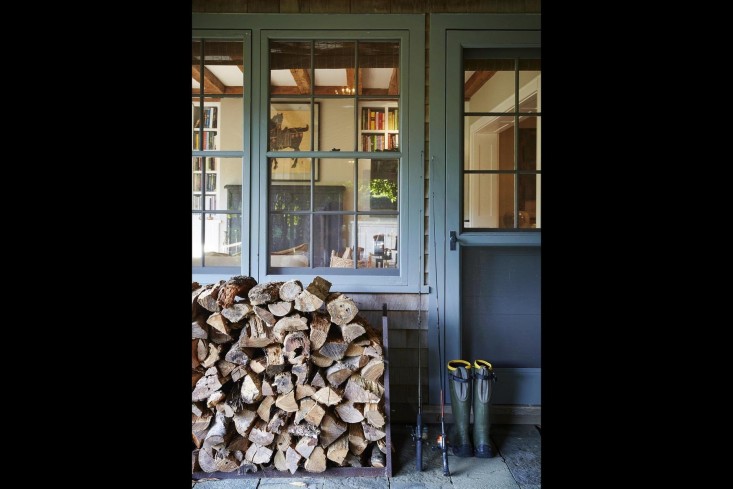 scott-mitchell-bridgehampton-landscape-garden-woodpile-porch-screened-door-boots-gardenista